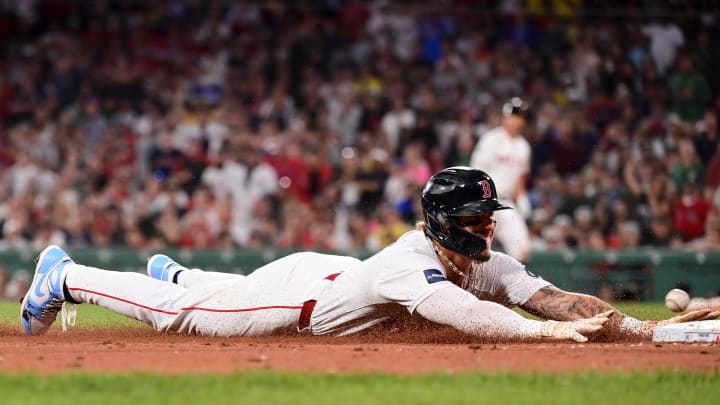 Boston Red Sox left fielder Jarren Duran (16) slides into third base during the seventh inning against the New York Yankees at Fenway Park on June 16.