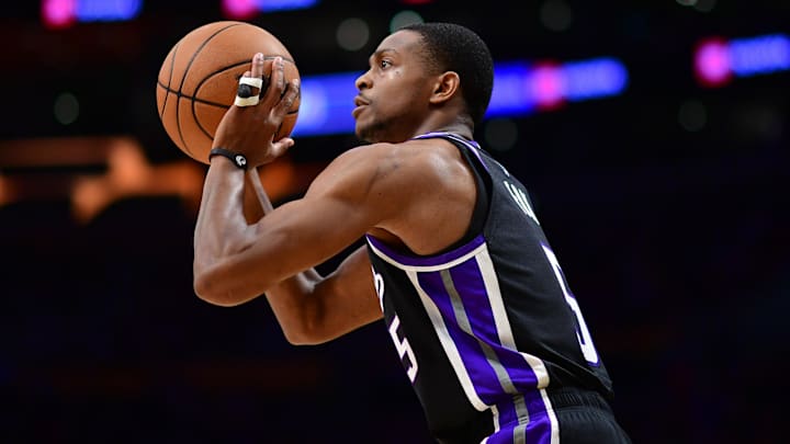Dec 28, 2024; Los Angeles, California, USA; Sacramento Kings guard De'Aaron Fox (5) shoots against the Los Angeles Lakers during the first half at Crypto.com Arena. 