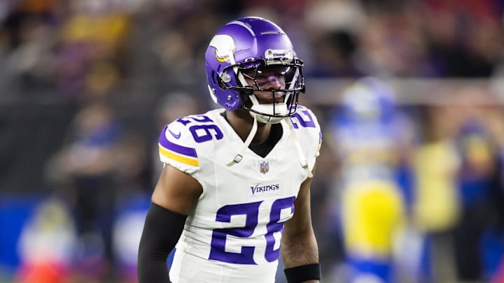 Jan 13, 2025; Glendale, AZ, USA; Minnesota Vikings safety Theo Jackson (26) against the Los Angeles Rams during an NFC wild card game at State Farm Stadium. Mandatory Credit: Mark J. Rebilas-Imagn Images