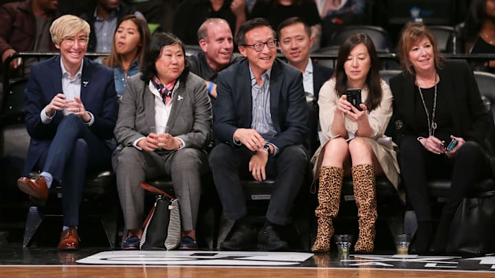 May 9, 2019; New York City, NY, USA; Taiwanese businessman Joe Tsai (center) cheers during the second half of the preseason WNBA game between the New York Liberty and the China National Team at Barclays Center. Mandatory Credit: Vincent Carchietta-Imagn Images May 9, 2019; New York City, NY, USA; Taiwanese businessman Joe Tsai (center) cheers during the second half of the preseason WNBA game between the New York Liberty and the China National Team at Barclays Center. Mandatory Credit: Vincent Carchietta-Imagn Images