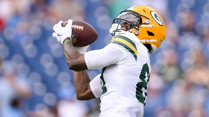 Sep 22, 2024; Nashville, Tennessee, USA;  Green Bay Packers wide receiver Romeo Doubs (87) makes a catch against the Tennessee Titans during pregame warmups at Nissan Stadium. Mandatory Credit: Steve Roberts-Imagn Images