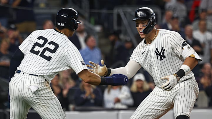 Sep 26, 2024; Bronx, New York, USA; New York Yankees center fielder Aaron Judge (99) celebrates with right fielder Juan Soto (22) after hitting a two run home run during the seventh inning against the Baltimore Orioles at Yankee Stadium. Mandatory Credit: Vincent Carchietta-Imagn Images