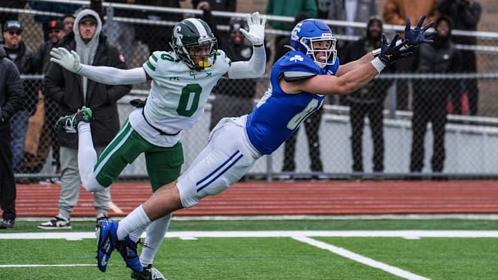 Novi Detroit Catholic Central‘s Jack Janda stretches out but fails to pull in the pass, while being covered by Cass Tech’s Lamont Wilcoxson in the fourth quarter during MHSAA semifinals at Troy Athens high school on Saturday, Nov. 23, 2024. Novi Detroit Catholic Central‘s Jack Janda stretches out but fails to pull in the pass, while being covered by Cass Tech’s Lamont Wilcoxson in the fourth quarter during MHSAA semifinals at Troy Athens high school on Saturday, Nov. 23, 2024.