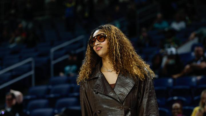 Sep 11, 2025; Chicago, Illinois, USA; Injured Chicago Sky forward Angel Reese (5) stands on the sidelines before a WNBA game against the New York Liberty at Wintrust Arena. Mandatory Credit: Kamil Krzaczynski-Imagn Images