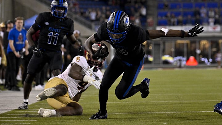 SMU wide receiver Key'Shawn Smith (9) and his Mustang teammates dominated Boston College on Saturday, besting the pre-game odds by more than 20 points.