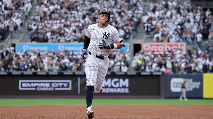 Mar 30, 2025; Bronx, New York, USA; New York Yankees right fielder Aaron Judge (99) rounds the bases after hitting a two run home run against the Milwaukee Brewers during the first inning at Yankee Stadium. Mandatory Credit: Brad Penner-Imagn Images