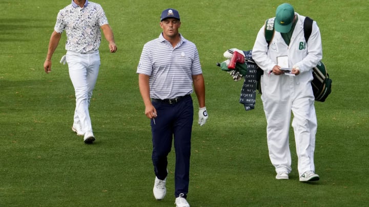Apr 11, 2024; Augusta, Georgia, USA; Bryson DeChambeau takes a breath as he approaches the 18th green. 