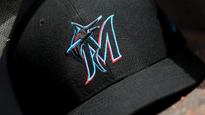 Apr 11, 2019; Cincinnati, OH, USA; A view of a New Era Miami Marlins hat in the dugout during the game against the Cincinnati Reds at Great American Ball Park. Mandatory Credit: Aaron Doster-Imagn Images