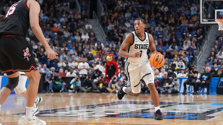 Mar 21, 2026; Buffalo, NY, USA; Michigan State Spartans guard Jeremy Fears Jr. (1) moves the ball in the second half against the Louisville Cardinals during a second round game of the men's 2026 NCAA Tournament at Keybank Center. Mandatory Credit: Gregory Fisher-Imagn Images Mar 21, 2026; Buffalo, NY, USA; Michigan State Spartans guard Jeremy Fears Jr. (1) moves the ball in the second half against the Louisville Cardinals during a second round game of the men's 2026 NCAA Tournament at Keybank Center. Mandatory Credit: Gregory Fisher-Imagn Images