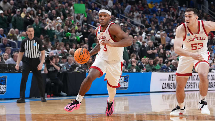 Mar 19, 2026; Buffalo, NY, USA; Louisville Cardinals guard Ryan Conwell (3) drives to the basket during the second half against the South Florida Bulls during a first round game of the men's 2026 NCAA Tournament at Keybank Center. Mandatory Credit: Gregory Fisher-Imagn Images Mar 19, 2026; Buffalo, NY, USA; Louisville Cardinals guard Ryan Conwell (3) drives to the basket during the second half against the South Florida Bulls during a first round game of the men's 2026 NCAA Tournament at Keybank Center. Mandatory Credit: Gregory Fisher-Imagn Images