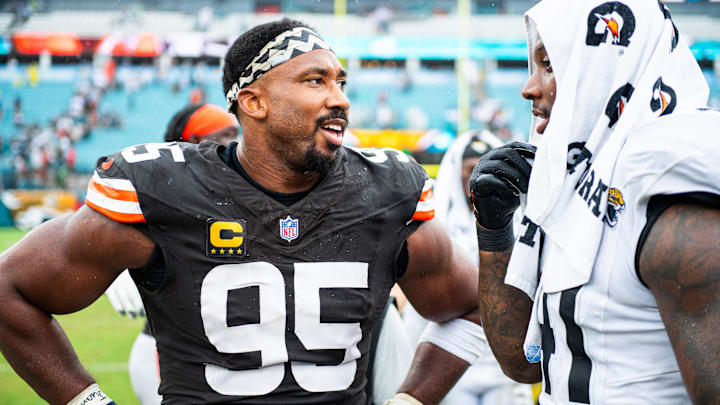 Sep 15, 2024; Jacksonville, Florida, USA; Cleveland Browns defensive end Myles Garrett (95) talks with Jacksonville Jaguars defensive end Josh Hines-Allen (41) after a game at EverBank Stadium. Mandatory Credit: Jeremy Reper-Imagn Images
