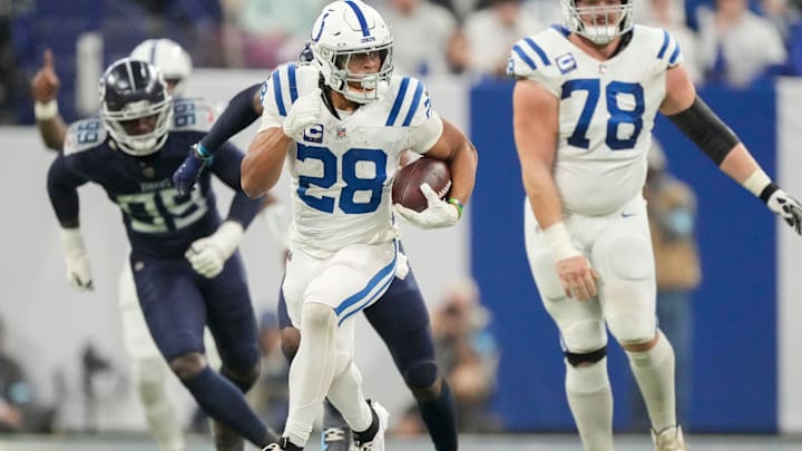 Indianapolis Colts running back Jonathan Taylor (28) rushes for a touchdown Sunday, Dec. 22, 2024, during a game against the Tennessee Titans at Lucas Oil Stadium in Indianapolis. Indianapolis Colts running back Jonathan Taylor (28) rushes for a touchdown Sunday, Dec. 22, 2024, during a game against the Tennessee Titans at Lucas Oil Stadium in Indianapolis.
