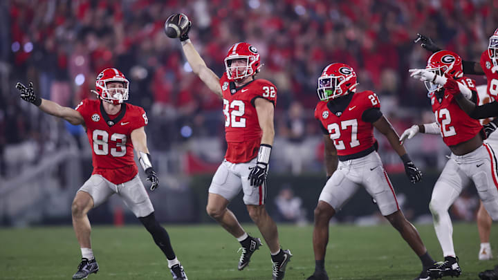 Nov 15, 2025; Athens, Georgia, USA; Georgia Bulldogs running back Cash Jones (32) and teammates celebrate during the second half against the Texas Longhorns at Sanford Stadium. Mandatory Credit: Brett Davis-Imagn Images