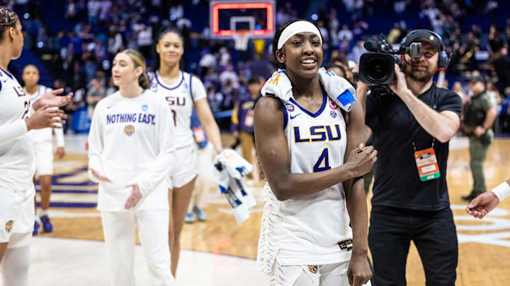 Mar 22, 2025; Baton Rouge, Louisiana, USA; LSU Lady Tigers guard Flau'Jae Johnson (4) celebrates after the game against the San Diego State Aztecs at Pete Maravich Assembly Center. Mandatory Credit: Stephen Lew-Imagn Images Mar 22, 2025; Baton Rouge, Louisiana, USA; LSU Lady Tigers guard Flau'Jae Johnson (4) celebrates after the game against the San Diego State Aztecs at Pete Maravich Assembly Center. Mandatory Credit: Stephen Lew-Imagn Images