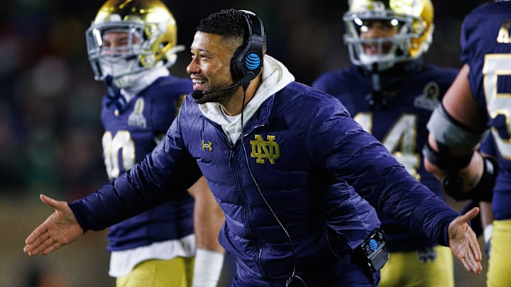 Notre Dame head coach Marcus Freeman celebrates a touchdown scored during the first round of the College Football Playoff between Notre Dame and Indiana University at Notre Dame Stadium on Friday, Dec. 20, 2024, in South Bend.