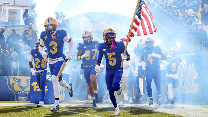 Nov 29, 2025; Pittsburgh, Pennsylvania, USA;  Pittsburgh Panthers linebacker Rasheem Biles (3) and wide receiver Raphael Williams Jr. (5) lead the team onto the field to play the Miami Hurricanes at Acrisure Stadium. Mandatory Credit: Charles LeClaire-Imagn Images