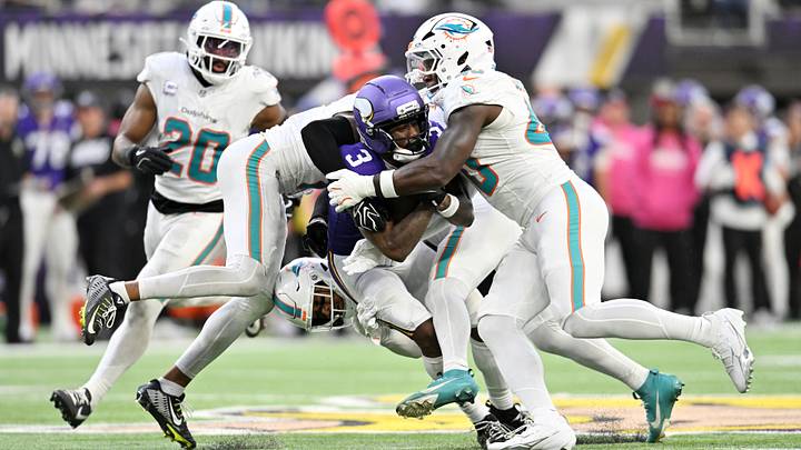Minnesota Vikings wide receiver Jordan Addison (3) is tackled during the fourth quarter against the Miami Dolphins at U.S. Bank Stadium. 