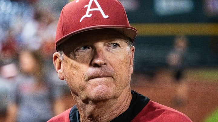 Jun 17, 2025; Omaha, Neb, USA; Arkansas Razorbacks head coach Dave Van Horn walks off the field after defeating the UCLA Bruins at Charles Schwab Field. Mandatory Credit: Dylan Widger-Imagn Images