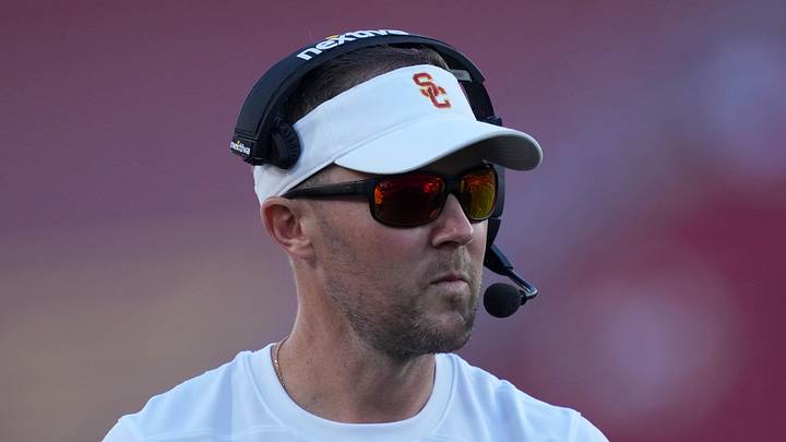 Oct 21, 2023; Los Angeles, California, USA; Southern California Trojans head coach Lincoln Riley watches from the sidelines against the Utah Utes in the first half at United Airlines Field at Los Angeles Memorial Coliseum. Mandatory Credit: Kirby Lee-Imagn Images