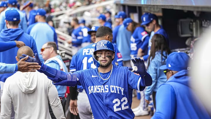 Mar 29, 2026; Cumberland, Georgia, USA; Kansas City Royals catcher Carter Jensen (22) reacts in the dugout after driving in a run with a sacrifice fly against the Atlanta Braves during the eighth inning at Truist Park. Mandatory Credit: Dale Zanine-Imagn Images