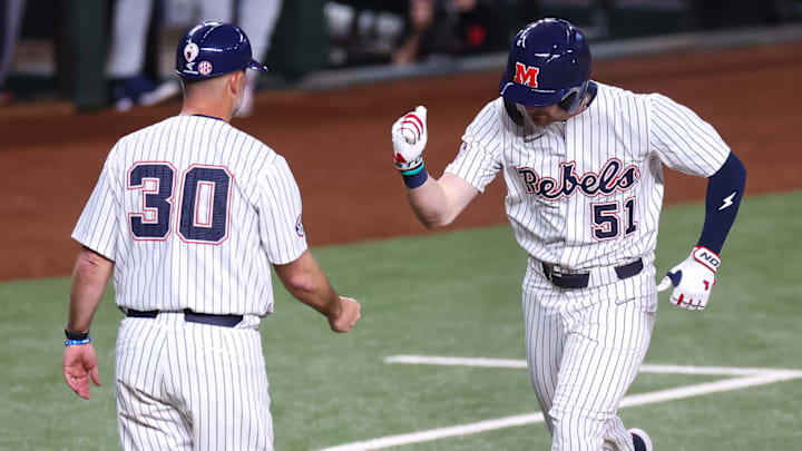 Ole Miss outfielder Isaac Humphrey rounds the bases after hitting a solo home run in a 2-1 win over the Arizona Wildcats at Globe Life Field in Arlington, Texas.