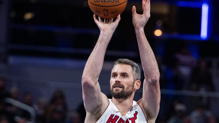 Nov 15, 2024; Indianapolis, Indiana, USA; Miami Heat forward Kevin Love (42) shoots the ball in the second half against the Indiana Pacers at Gainbridge Fieldhouse. Mandatory Credit: Trevor Ruszkowski-Imagn Images