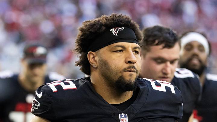 Dec 21, 2025; Glendale, Arizona, USA; Atlanta Falcons offensive lineman Jovaughn Gwyn (52) against the Arizona Cardinals at State Farm Stadium. Mandatory Credit: Mark J. Rebilas-Imagn Images