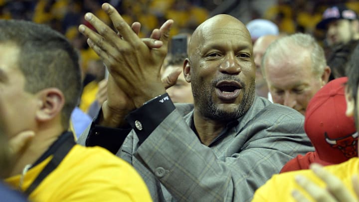 NBA player Ron Harper cheers in the fourth quarter in game one of the second round of the NBA Playoffs at Quicken Loans Arena. NBA player Ron Harper cheers in the fourth quarter in game one of the second round of the NBA Playoffs at Quicken Loans Arena.