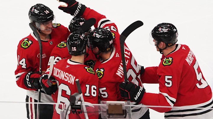 Dec 19, 2024; Chicago, Illinois, USA; Chicago Blackhawks right wing Ilya Mikheyev (95) celebrates a goal against the Seattle Kraken during the third period at United Center. Mandatory Credit: David Banks-Imagn Images