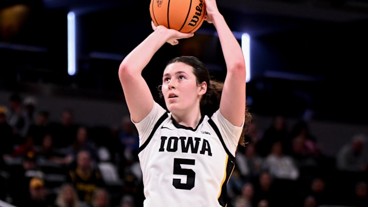 Mar 7, 2026; Indianapolis, IN, USA; Iowa Hawkeyes center Ava Heiden (5) shoots the ball against the Michigan Wolverines during the first half at Gainbridge Fieldhouse. Mandatory Credit: Robert Goddin-Imagn Images