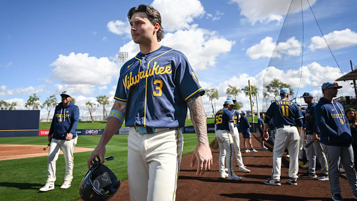 Milwaukee Brewers infield prospect Andrew Fischer walks across the field during spring training workouts Tuesday, February 17, 2026, at American Family Fields of Phoenix in Phoenix, Arizona.