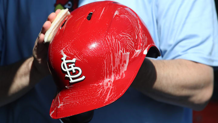Apr 9, 2025; Pittsburgh, Pennsylvania, USA; The St. Louis Cardinals equipment manger scrubs the team batting helmets before the game against the Pittsburgh Pirates at PNC Park. Mandatory Credit: Charles LeClaire-Imagn Images Apr 9, 2025; Pittsburgh, Pennsylvania, USA; The St. Louis Cardinals equipment manger scrubs the team batting helmets before the game against the Pittsburgh Pirates at PNC Park. Mandatory Credit: Charles LeClaire-Imagn Images