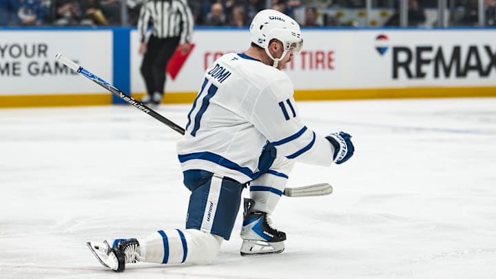 Jan 31, 2026; Vancouver, British Columbia, CAN; Toronto Maple Leafs forward Max Domi (11) celebrates his goal against the Vancouver Canucks in the third period at Rogers Arena. Mandatory Credit: Bob Frid-Imagn Images