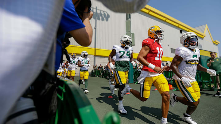 Green Bay Packers quarterback Jordan Love (10) runs onto the practice field for his first practice of training camp last year. Green Bay Packers quarterback Jordan Love (10) runs onto the practice field for his first practice of training camp last year.