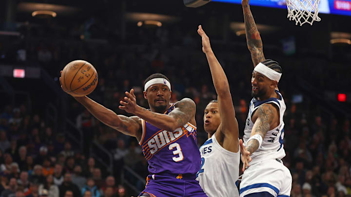 Jan 29, 2025; Phoenix, Arizona, USA; Phoenix Suns guard Bradley Beal (3) makes a pass against Minnesota Timberwolves guard Nickeil Alexander-Walker (9) in the second half at Footprint Center. Mandatory Credit: Mark J. Rebilas-Imagn Images