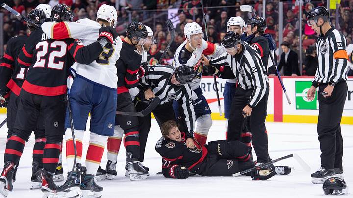 Oct 21, 2026; Ottawa, Ontario, CAN; Florida Panthers center Sam Bennett (9) takes a penalty for slashing following a scuffle between left wing Brady Tkachuk and Ottawa Senators center Ridly Greig (71) in the second period at the Canadian Tire Centre. Mandatory Credit: Marc DesRosiers-Imagn Oct 21, 2026; Ottawa, Ontario, CAN; Florida Panthers center Sam Bennett (9) takes a penalty for slashing following a scuffle between left wing Brady Tkachuk and Ottawa Senators center Ridly Greig (71) in the second period at the Canadian Tire Centre. Mandatory Credit: Marc DesRosiers-Imagn