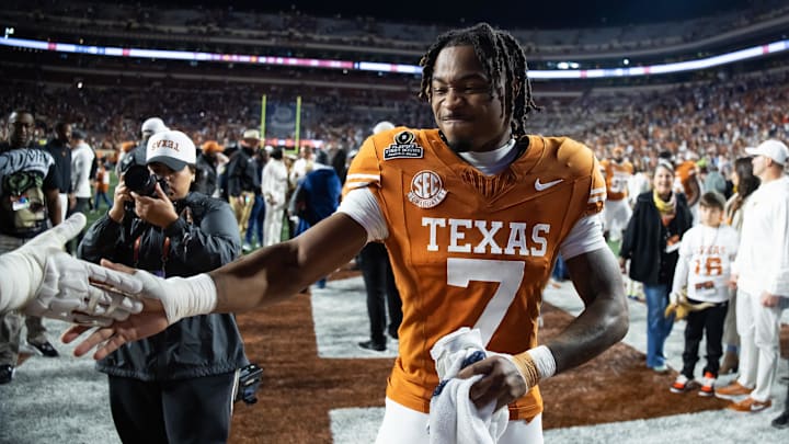 Dec 21, 2024; Austin, Texas, USA; Texas Longhorns defensive back Jahdae Barron (7) against the Clemson Tigers during the CFP National playoff first round at Darrell K Royal-Texas Memorial Stadium. Mandatory Credit: Mark J. Rebilas-Imagn Images Dec 21, 2024; Austin, Texas, USA; Texas Longhorns defensive back Jahdae Barron (7) against the Clemson Tigers during the CFP National playoff first round at Darrell K Royal-Texas Memorial Stadium. Mandatory Credit: Mark J. Rebilas-Imagn Images