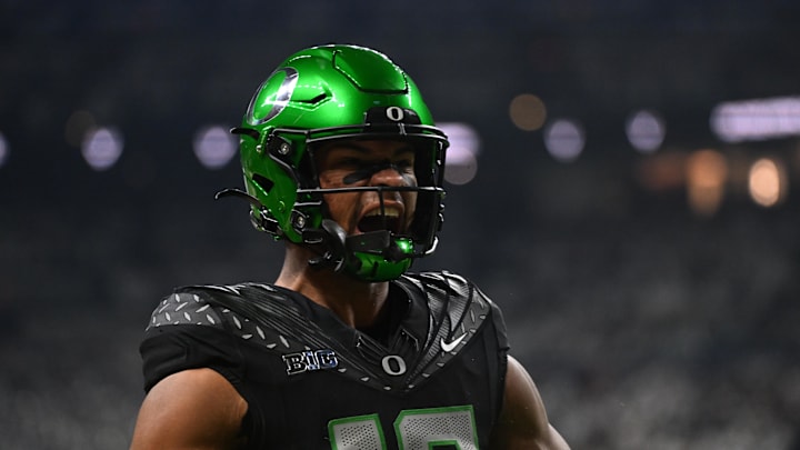 Dec 7, 2024; Indianapolis, IN, USA; Oregon Ducks tight end Kenyon Sadiq (18) reacts after a touchdown during the first quarter against the Penn State Nittany Lions in the 2024 Big Ten Championship game at Lucas Oil Stadium. Dec 7, 2024; Indianapolis, IN, USA; Oregon Ducks tight end Kenyon Sadiq (18) reacts after a touchdown during the first quarter against the Penn State Nittany Lions in the 2024 Big Ten Championship game at Lucas Oil Stadium.