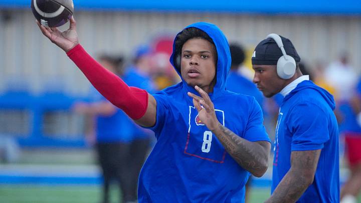 Sep 11, 2026; Lawrence, Kansas, USA; Kansas Jayhawks quarterback Isaiah Marshall (8) warms up against the Missouri Tigers prior to a game at David Booth Kansas Memorial Stadium. Mandatory Credit: Denny Medley-Imagn Images Sep 11, 2026; Lawrence, Kansas, USA; Kansas Jayhawks quarterback Isaiah Marshall (8) warms up against the Missouri Tigers prior to a game at David Booth Kansas Memorial Stadium. Mandatory Credit: Denny Medley-Imagn Images