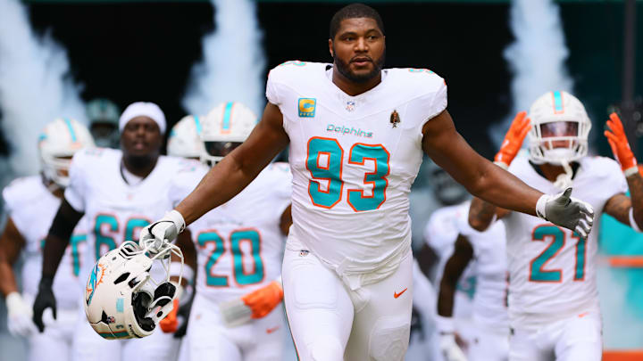 Oct 27, 2024; Miami Gardens, Florida, USA; Miami Dolphins defensive tackle Calais Campbell (93) enters the field before the game against the Arizona Cardinals at Hard Rock Stadium. Oct 27, 2024; Miami Gardens, Florida, USA; Miami Dolphins defensive tackle Calais Campbell (93) enters the field before the game against the Arizona Cardinals at Hard Rock Stadium.
