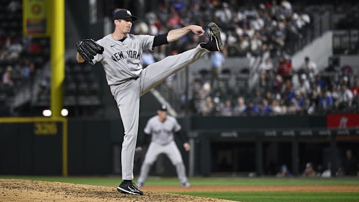 Sep 2, 2024; Arlington, Texas, USA; New York Yankees relief pitcher Tim Hill (54) pitches against the Texas Rangers during the ninth inning at Globe Life Field. Mandatory Credit: Jerome Miron-Imagn Images Sep 2, 2024; Arlington, Texas, USA; New York Yankees relief pitcher Tim Hill (54) pitches against the Texas Rangers during the ninth inning at Globe Life Field. Mandatory Credit: Jerome Miron-Imagn Images