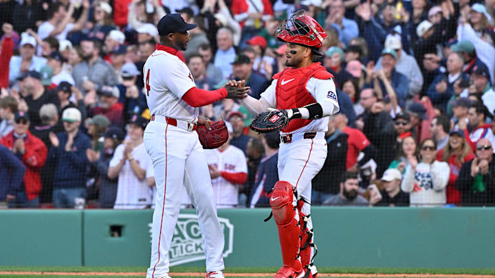 Apr 3, 2026; Boston, Massachusetts, USA; Boston Red Sox relief pitcher Aroldis Chapman (44) and catcher Carlos Narvaez (75) celebrate beating the San Diego Padres  at Fenway Park. Mandatory Credit: Eric Canha-Imagn Images