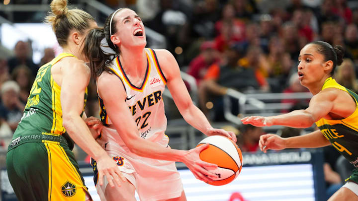 Indiana Fever guard Caitlin Clark (22) drives the lane against the Seattle Storm on Thursday, May 30, 2024, during the WNBA game at Gainbridge Fieldhouse in Indianapolis. The Seattle Storm defeated the Indiana Fever 103-88.