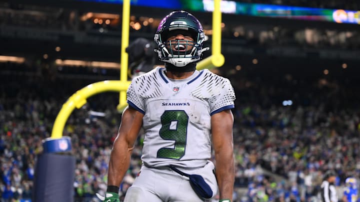 Seattle Seahawks running back Kenneth Walker III (9) celebrates after scoring a touchdown against the Los Angeles Rams in the second half at Lumen Field. 