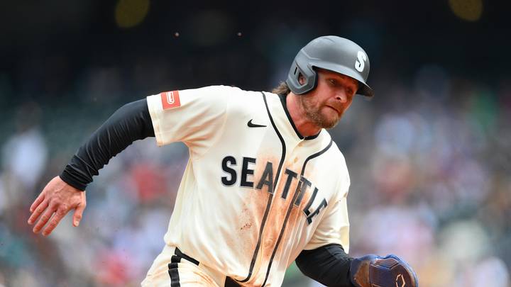 Apr 12, 2026; Seattle, Washington, USA; Seattle Mariners third baseman Brendan Donovan (33) runs towards home plate to score a run against the Houston Astros during the first inning at T-Mobile Park. Mandatory Credit: Steven Bisig-Imagn Images Apr 12, 2026; Seattle, Washington, USA; Seattle Mariners third baseman Brendan Donovan (33) runs towards home plate to score a run against the Houston Astros during the first inning at T-Mobile Park. Mandatory Credit: Steven Bisig-Imagn Images