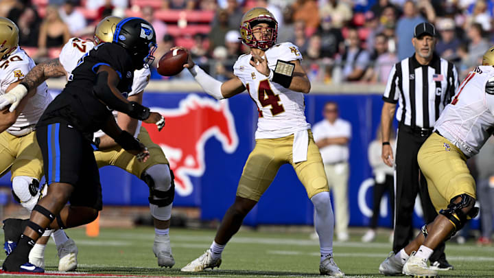 Nov 16, 2024; Dallas, Texas, USA; Boston College Eagles quarterback Grayson James (14) drops back to pass against the SMU Mustangs during the first half at the Gerald J. Ford Stadium. Mandatory Credit: Jerome Miron-Imagn Images