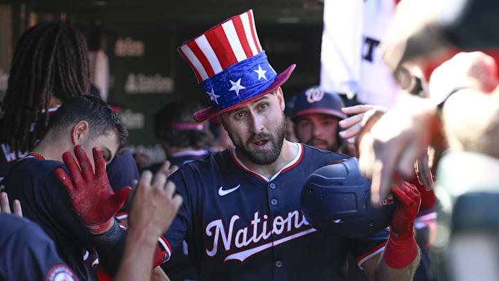 Sep 21, 2024; Chicago, Illinois, USA;  Washington Nationals first baseman Joey Gallo (24) celebrates in the dugout after he hits a three run home run against the Chicago Cubs during the sixth inning at Wrigley Field. 