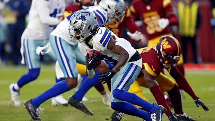 Dallas Cowboys wide receiver KaVontae Turpin breaks a tackle against the Washington Commanders to break free for a touchdown
