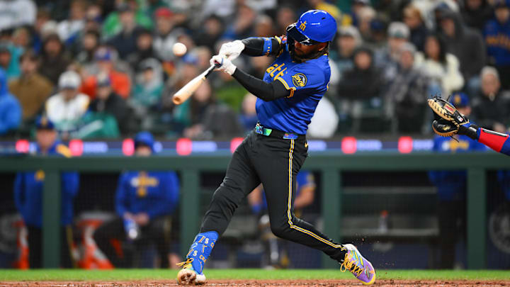 Seattle Mariners shortstop J.P. Crawford hits an RBI single against the Texas Rangers on April 11 at T-Mobile Park.