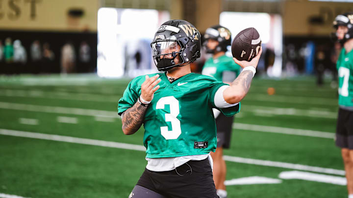 Wake Forest quarterback Gio Lopez throws pass in spring practice Wake Forest quarterback Gio Lopez throws pass in spring practice